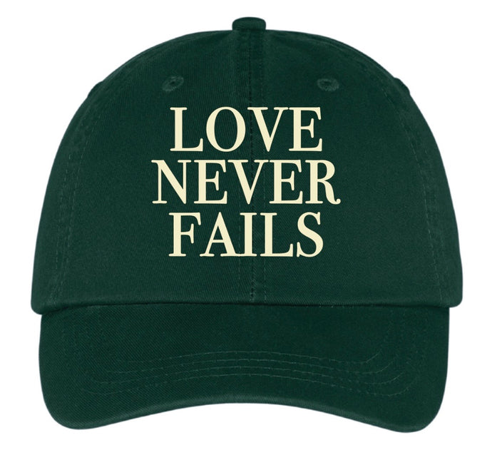 Love Never Fails baseball cap in Hunter Green
